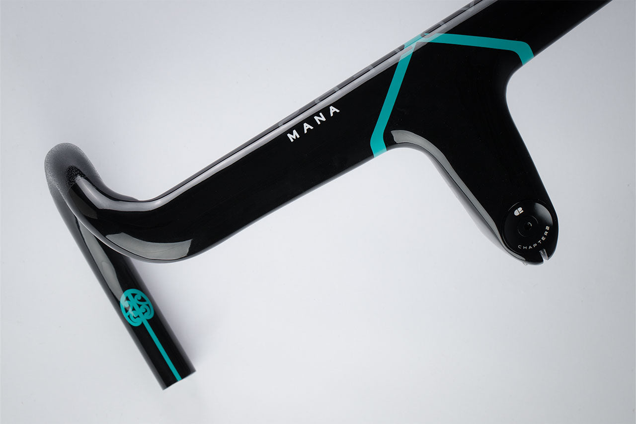 Chapter2 MANA2 Carbon Handlebar in black and aqua lightweight aero design for precise control and comfortable performance