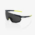 100% Racetrap 3.0 Gloss Black Sunglasses with Smoke Lens providing UV protection and clear vision for performance cycling